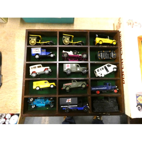 187 - Berkertex car display case and cars including Days Gone By