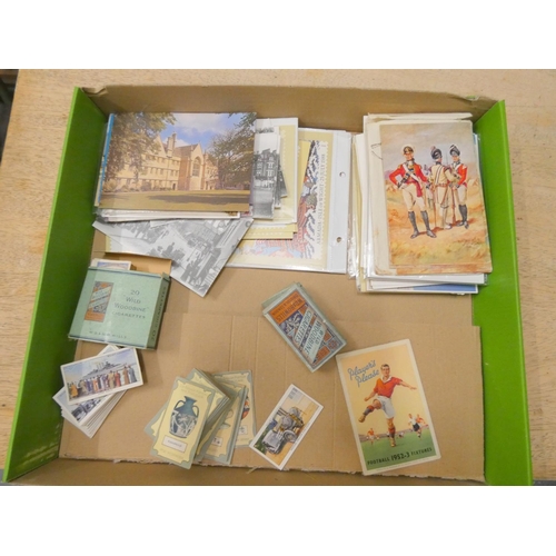 214 - Box of various postcards and collectable cigarette cards.