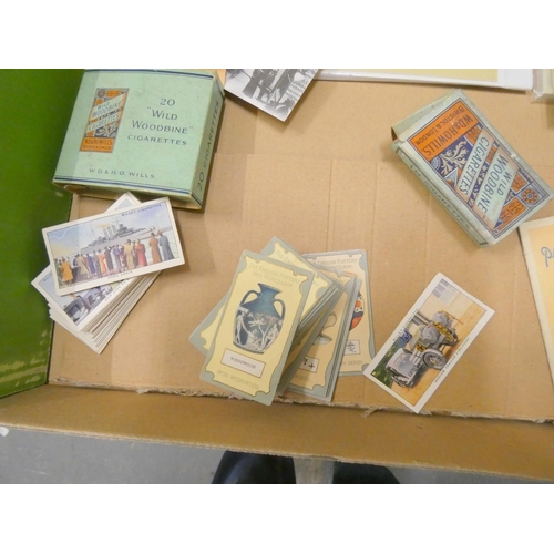 214 - Box of various postcards and collectable cigarette cards.