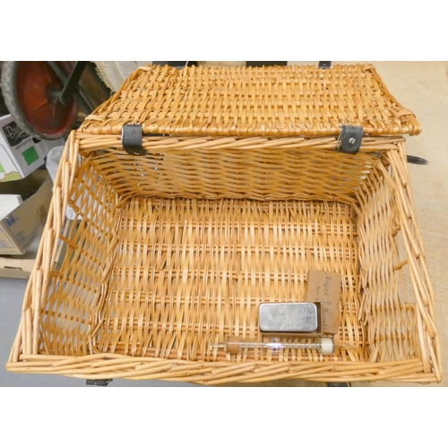 220 - Wicker basket, stamp album, glass syringe.