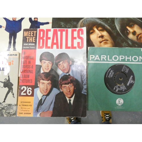 229 - Various Beatles records and magazine.