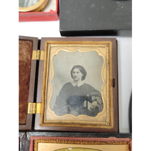 304 - Group of curios to include 19th century Daguerrotype's, similar period cases and ebonised photo fram... 