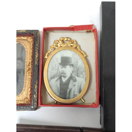 304 - Group of curios to include 19th century Daguerrotype's, similar period cases and ebonised photo fram... 