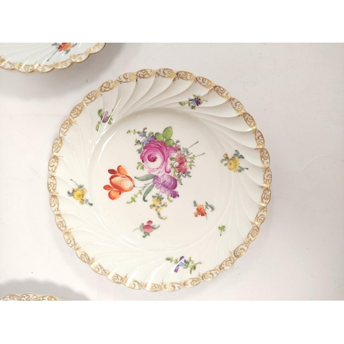 323 - Set of six Carl Schumann, Dresden style side plates, each with colourful floral sprays on white grou... 