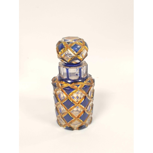 414 - Bohemian yellow and white overlaid glass vase, circa early 20th century, with dimple cut slender nec... 