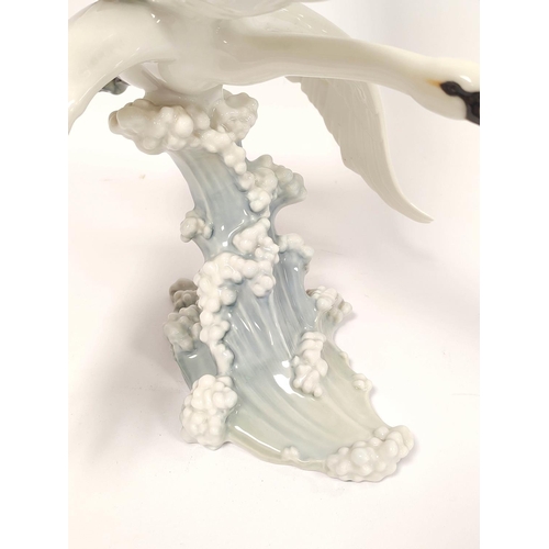 342 - German porcelain figure group of flying swans by Kulschenreuther, backstamp to underside, 32cm high,... 