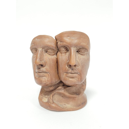 374 - Modernist clay sculpture modelled as twin busts of a male head, in similar style to the busts of for... 