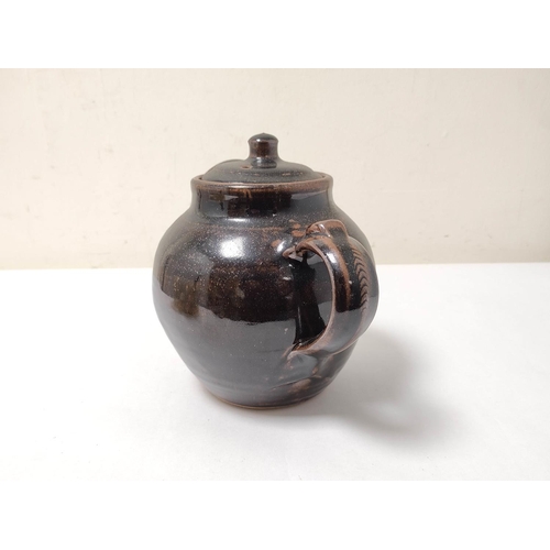 339 - Ray Finch, WinchcomeStudio pottery treacle glazed teapot with cover, 17cm high.... 