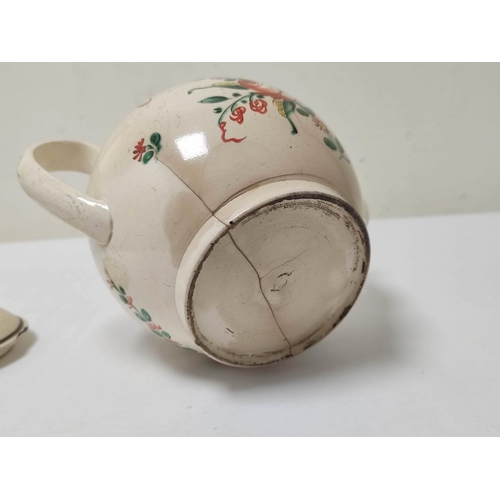 338 - Late 18th century English creamware globular teapot, cracking & other damages, painted with flow... 