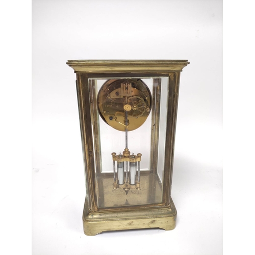 188 - Late 19th century French gilt brass four glass mantel clock, the twin train enamel dial with skeleto... 