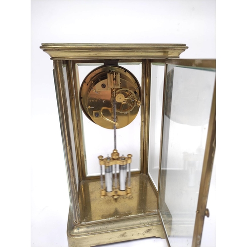 188 - Late 19th century French gilt brass four glass mantel clock, the twin train enamel dial with skeleto... 