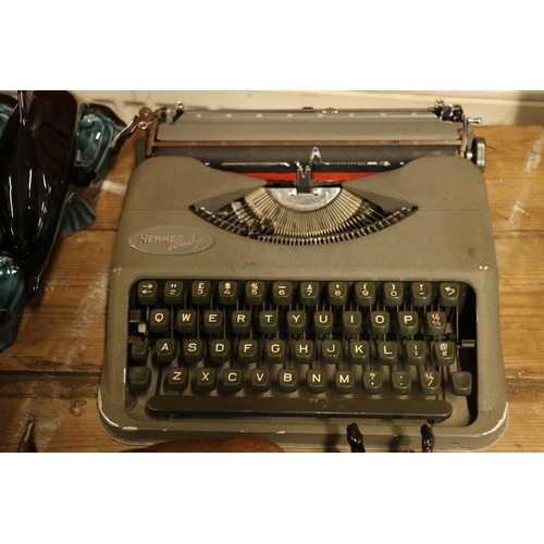 100 - Hermes Baby portable typewriter.