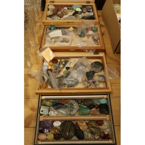 104 - Four boxes containing mineral and geological specimens.