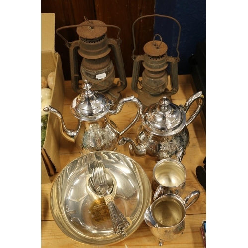 108 - Two miner's lamps along with silver-plated items.