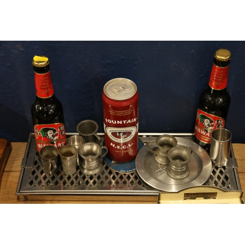 113 - Breweriana to include McEwans beer bottles, a Fountain McEwans Beer can, still complete, with pewter... 