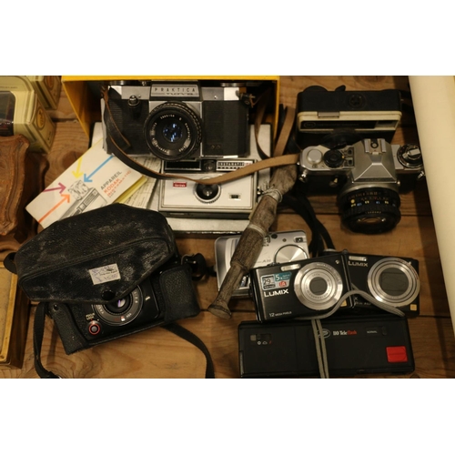 114 - Cameras to include Praktica, Yashika, Lumix, etc., together with reproduction maps.