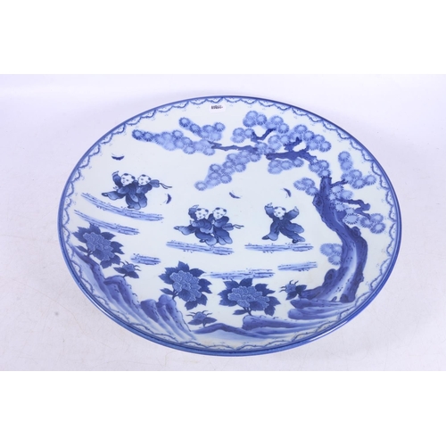 123 - Modern Chinese blue and white charger decorated with children playing, 39cm.