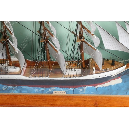 127 - Mid-20th century hand built model of a three masted ship 'The Crusader' in glass display case, 28cm ... 