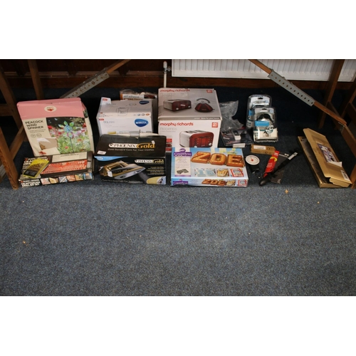 140 - Morphy Richards toaster, boxed, a Phoenix Gold iron, a Britta water jug, etc.