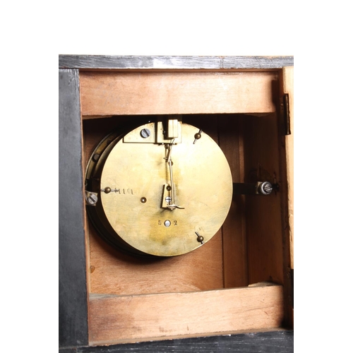 142 - Mahogany cased mantel clock, 22cm high.