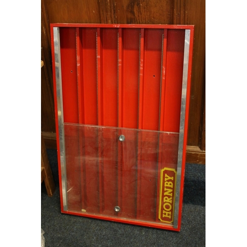 154 - Model railways wall display case with sliding glass doors and Hornby plaque.