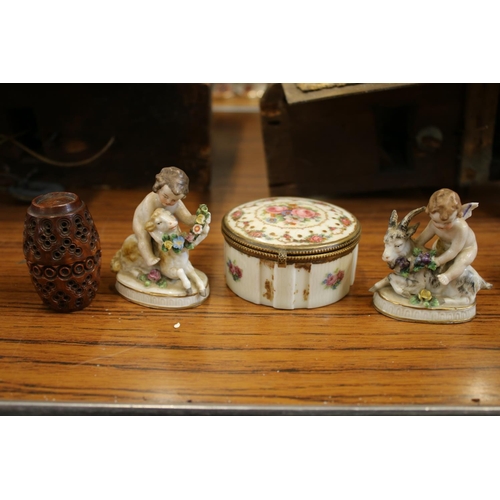 171 - French porcelain transfer printed circular patchbox, a pair of hard past porcelain figures with goat... 