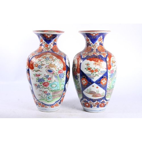 191 - Pair of oriental baluster vases, 30cm high.