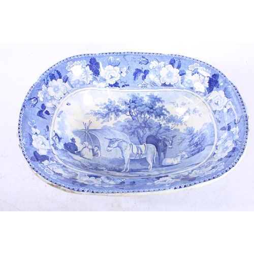 193 - 19th century transfer printed blue and white oval dish decorated with 'domestic cattle scene showing... 