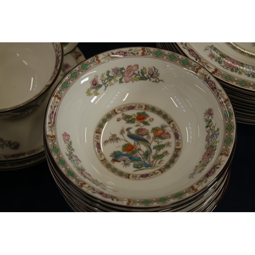 201 - Wedgwood Kutani Crane dinner and tea service comprising soup coupes and stands, cups and saucers, di... 