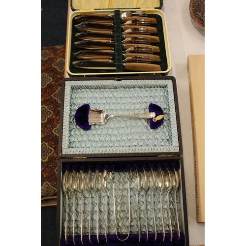 202 - Silver-plated teaspoons in case with a fish knives and forks set, and other cased cutlery sets.