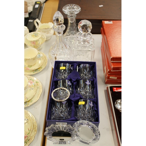 208 - Six Edinburgh Crystal cut-glass beakers, a Waterford Glass frame, decanters, etc.