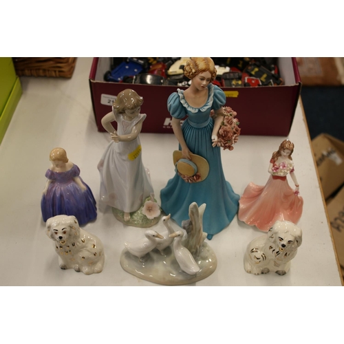 211 - Lladro girl figurine, two Beswick spaniel models, Royal Doulton small figurines and a Capodimonte fi... 