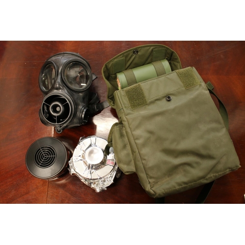 241 - Early 2000s British Army respirator in original green haversack.