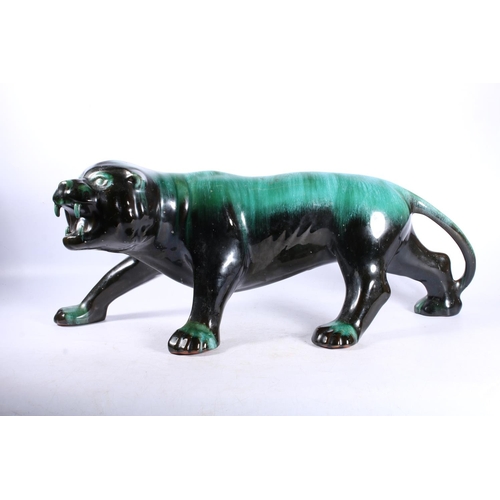 247 - Blue Mountain Pottery model of a tiger, 60cm long.