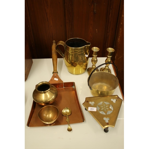 251 - Brass and copper ware to include candlesticks, trivets, etc.