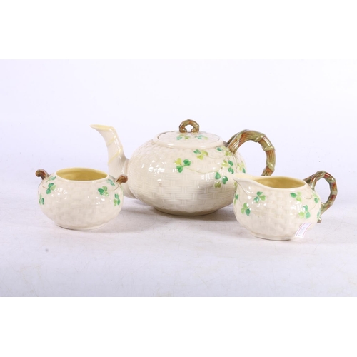 74 - Belleek shamrock three piece teaset.