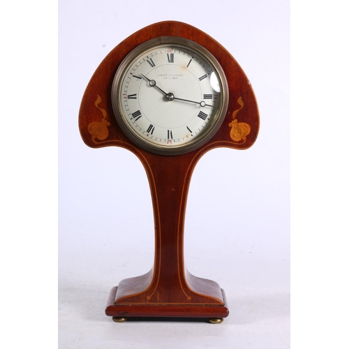 86 - Edwardian mahogany Art Nouveau mantel clock with satinwood inlay, 26cm high.