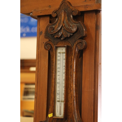 95 - Early 20th century oak framed wheel barometer.