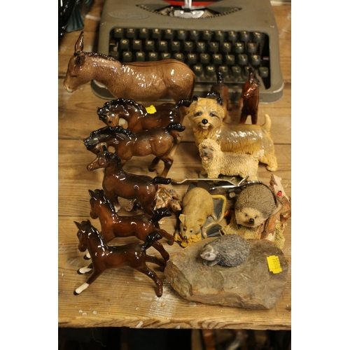 99 - Beswick to include a donkey, foals, and a Cairn Terrier, and other ceramic animal models.