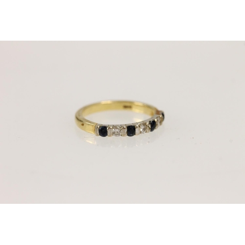 502 - 18ct gold sapphire and diamond half eternity ring, size M