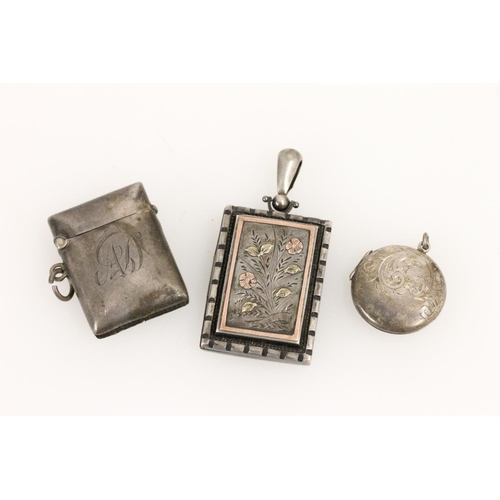 511 - Edwardian white metal locket with inlaid floral decoration, hallmarked silver vesta case and a round... 