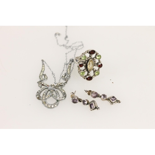 522 - White metal gem set ring, pair of silver and amethyst drop earrings and a marcasite pendant