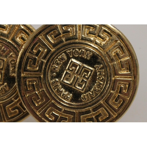 528 - Pair of Givenchy gilt metal costume jewellery clip on earrings of roundel form with Greek key design