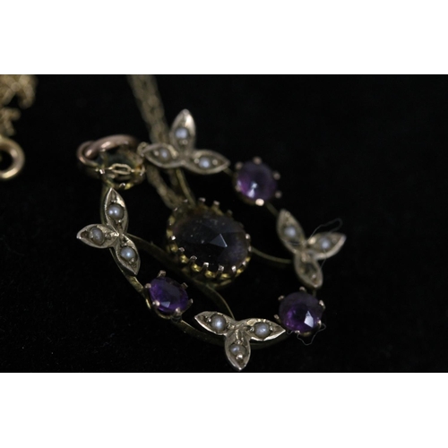 532 - Edwardian 9ct gold amethyst and seed pearl pendant on yellow metal chain, pendant H3cm to top of bal... 