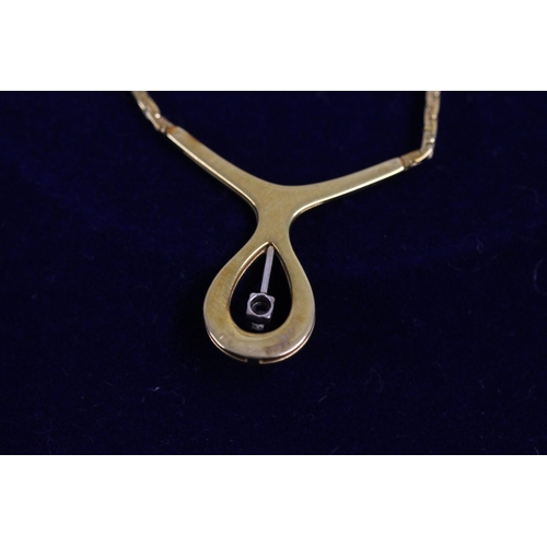 535 - 9ct gold modernist pendant and integral necklace set with small, suspended diamond in Ernest Jones r... 