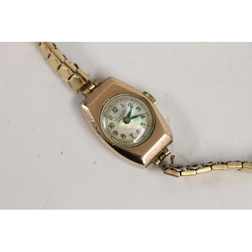 570 - Vintage Everite 9ct gold ladies wristwatch on rolled gold bracelet