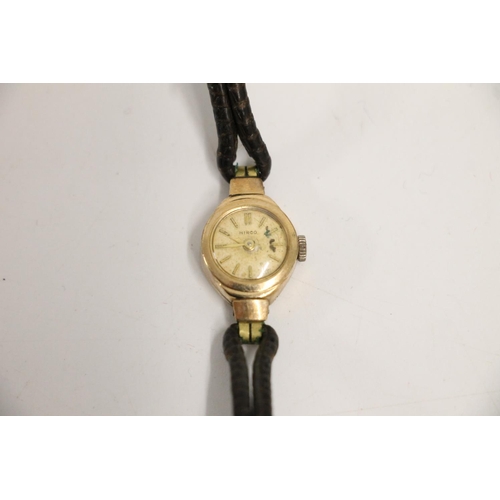 572 - Hirco 9ct gold ladies wristwatch on leather strap