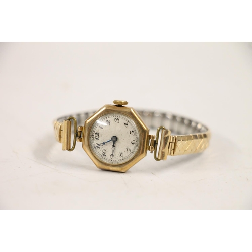 579 - 9ct gold Stolkace ladies wristwatch on base metal strap