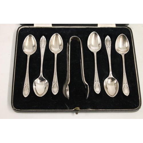 594 - Cased set of six silver teaspoons with matching sugar tongs, Sheffield 1932, 105g