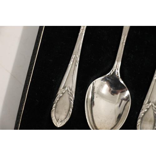 594 - Cased set of six silver teaspoons with matching sugar tongs, Sheffield 1932, 105g